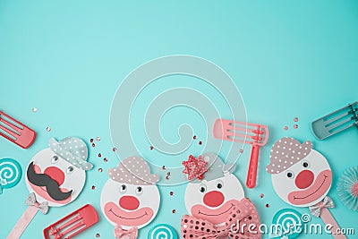 Jewish holiday Purim background with cute paper clowns characters and noisemaker Stock Photo