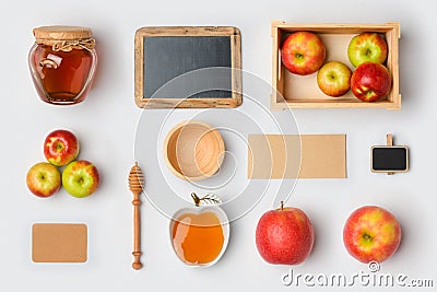 Jewish holiday Rosh Hashana mock up template with honey jar,apples and chalkboard. View from above. Flat lay Stock Photo