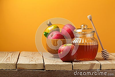 Jewish holiday Rosh Hashana (New Year) celebration with honey jar and apples Stock Photo