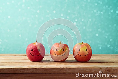 Jewish holiday Rosh Hashanah background with smiling apples Stock Photo