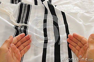 Jewish man hands over tallit. Jewish traditional symbol. Rosh hashanah jewish New Year holiday, Shabbat and Yom kippur concept. Stock Photo