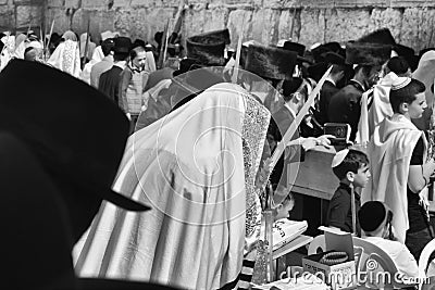 Religious men praying at the wailing wall in Jerusalem during Sukkot Editorial Stock Photo