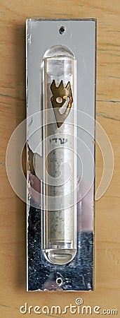 A Jewish Mezuzah which is mounted on the side post of a door way. Stock Photo