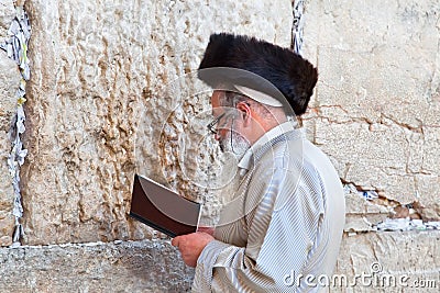 Jewish praying at the western wall Editorial Stock Photo