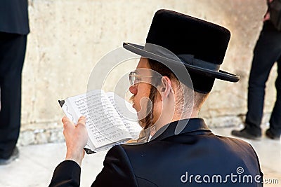 Jewish praying at the western wall Editorial Stock Photo