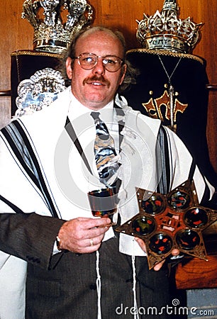 Jewish rabbi poses for a photo inside a synagogue Editorial Stock Photo