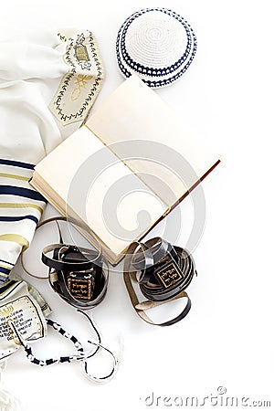 Jewish ritual objects, prayer vestments, Tefillin , Tallit, Kippah and Tora Stock Photo