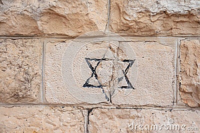 Jewish star David forged in stone Stock Photo