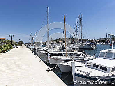 Jezera, Croatia-June 3rd, 2021: Anchored fishing boats in the port of small fishing village Jezera, located on Murter island, Editorial Stock Photo