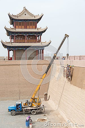 Restoration is under work in Jiayuguan Pass, west end of Great Wall in Jiayuguan, Gansu, China. Editorial Stock Photo