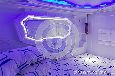 JIAYUGUAN, CHINA - AUGUST 21, 2018: Capsule interior in Herdsman Youth Hostel in Jiayuguan, Gansu Province, Chi Editorial Stock Photo