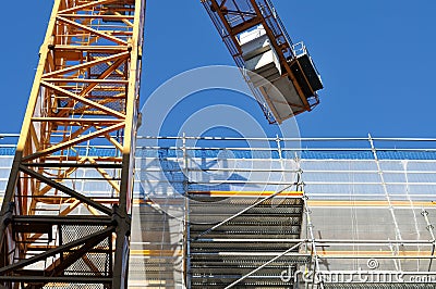 Concrete counterweigt at jib of a construction crane Stock Photo