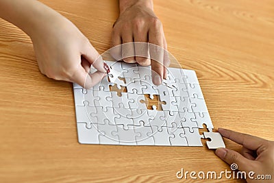 Jigsaw puzzle piece.Finally finding solution. Stock Photo