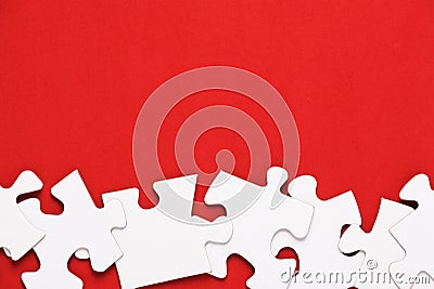 Jigsaw Puzzle on Red Stock Photo