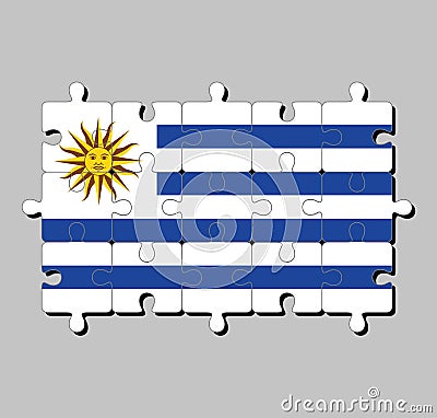 Jigsaw puzzle of Uruguay flag in horizontal stripes of white alternate with light blue and the Sun of May. Vector Illustration