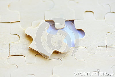 Jigsaw puzzle on white background top view - jigsaw piece connecting business solutions success and strategy concept Stock Photo