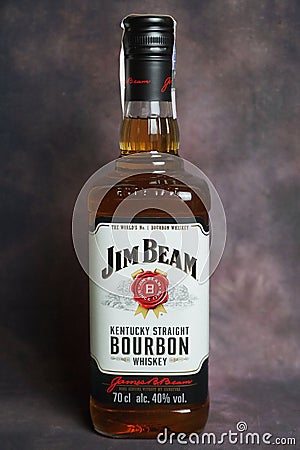 Jim Beam whiskey bottle on dark vintage background Editorial Stock Photo