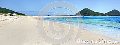 Jimmys Beach Hawks Nest eastern end with Mt Tomaree in view. Stock Photo