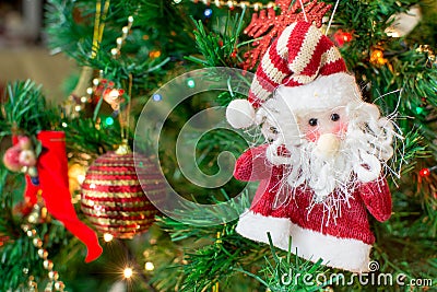 Jingle bell, Christmas tree branches with blurred background. Stock Photo