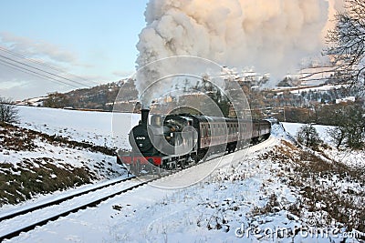 Jinty Steam Locomotive on a Santa Special at the Keighley and Worth Valley Railway, Oakworth, West Yorkshire, UK - January 2010 Editorial Stock Photo