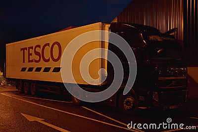 Jirkov, Czech republic - December 08, 2018: black camion stand about Tesco market in centre of Jirkov city in christmas time Editorial Stock Photo