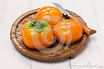 Jiro kaki, japanese persimmon Stock Photo