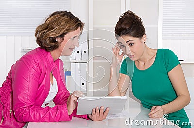 Job interview or business meeting under two woman. Stock Photo