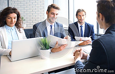 Job interview with the employer, businessman listen to candidate answers. Stock Photo