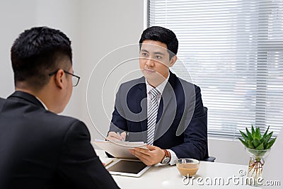 Job interview of two business professionals. Greeting new colleague Stock Photo