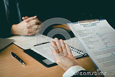 Job seekers are talking to job interviewers and explain about their work history Stock Photo