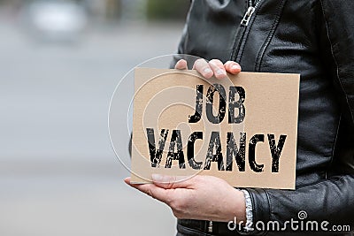 JOB VACANCY. Employment and workplace concept. Text on the broadsheet Stock Photo