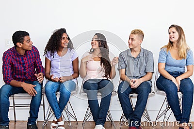 Jobless young adults waiting for a job interview Stock Photo