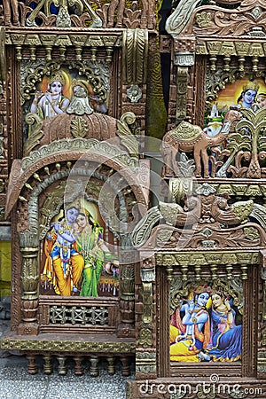 Beautiful framed art of Radha and Krishna, Hindu God, displayed for sale at famous Sardar Market and Ghanta ghar Clock tower in Editorial Stock Photo