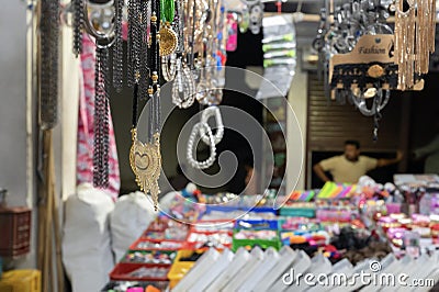 Various colorful shapes and shades of costume jewelleries, junk jewelleries, handicrafts Editorial Stock Photo