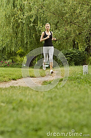 Jogging in park Stock Photo