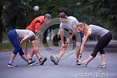 Jogging people group stretching Stock Photo