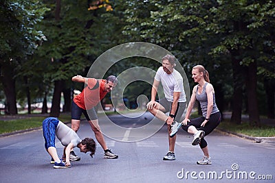 Jogging people group stretching Stock Photo