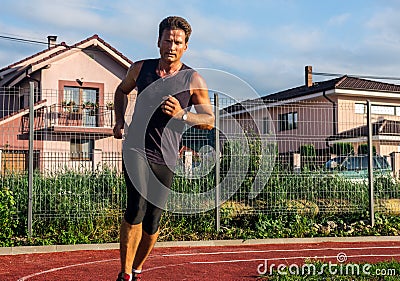 Jogging, relaxation after the working day Stock Photo