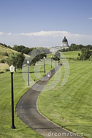 Jogging track in city park leading to South Dakota State Capitol Editorial Stock Photo