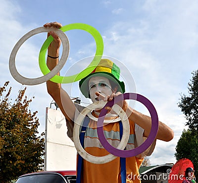 Joggling clown artist in Italy Editorial Stock Photo
