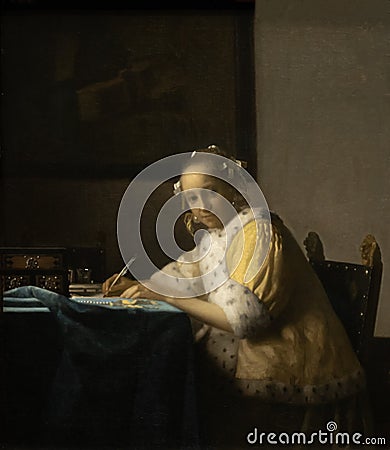 Lady writing a letter in yellow by Dutch golden age painter Johannes Vermeer Editorial Stock Photo
