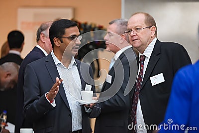 Delegates networking at corporate conference Editorial Stock Photo