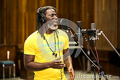 African Artist Tiken Jah Fakoly, Cote d`Ivoire singing in a SABC recording studio Editorial Stock Photo