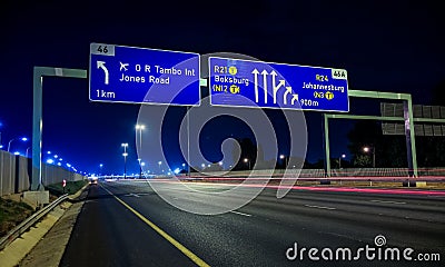 Motorway Signs on Highway at night Editorial Stock Photo