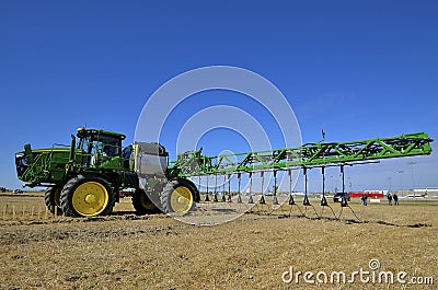 John Deere Sprayer and extended booms Editorial Stock Photo