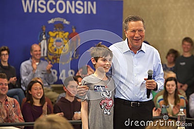 John Kasich embracing a young supporter Editorial Stock Photo