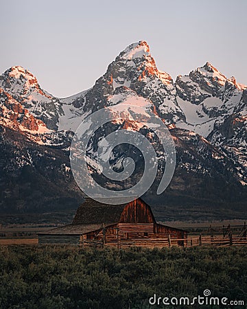 John Moulton Barn in Grand Teton National Park on Mormon Row during sunrise. Stock Photo