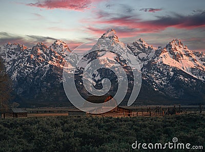 John Moulton Barn in Grand Teton National Park on Mormon Row during sunrise. Stock Photo