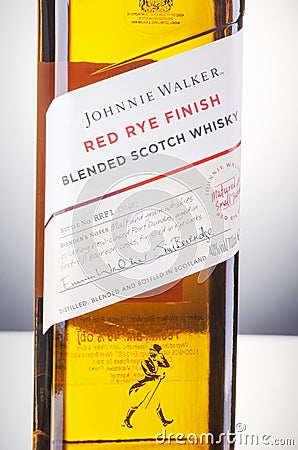 Johnnie Walker red rye finish blended whisky on gradient background. Editorial Stock Photo
