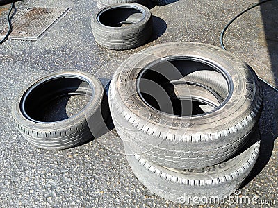Used tires with worn tire treads. Editorial Stock Photo